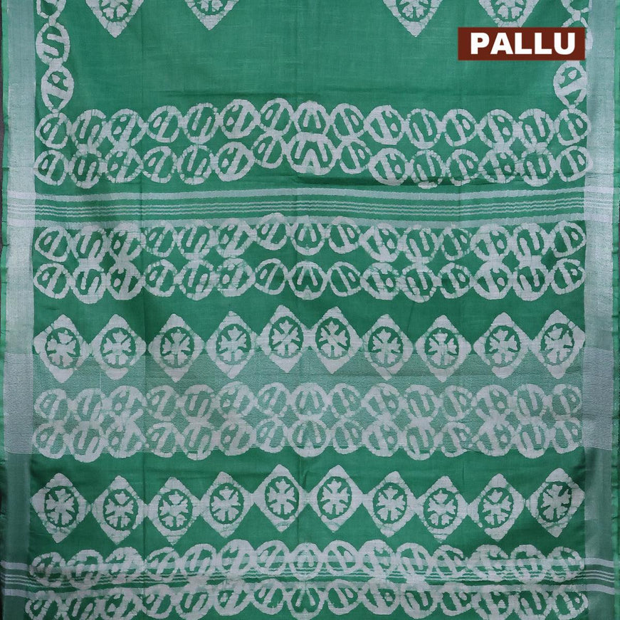 Linen cotton saree green with allover batik butta prints and silver zari woven border