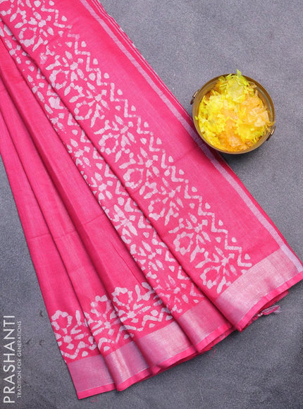 Linen cotton saree pink with allover batik butta prints and silver zari woven border