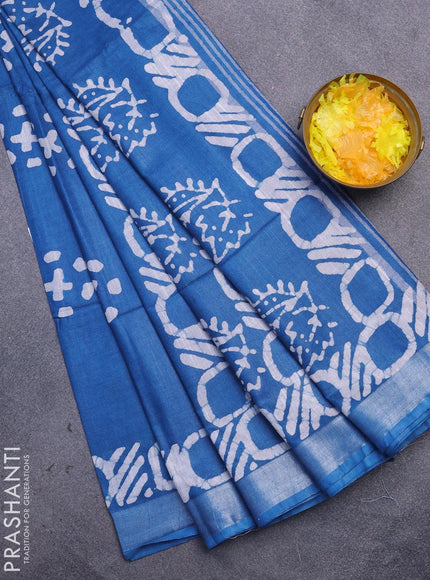 Linen cotton saree cs blue with allover batik butta prints and silver zari woven border