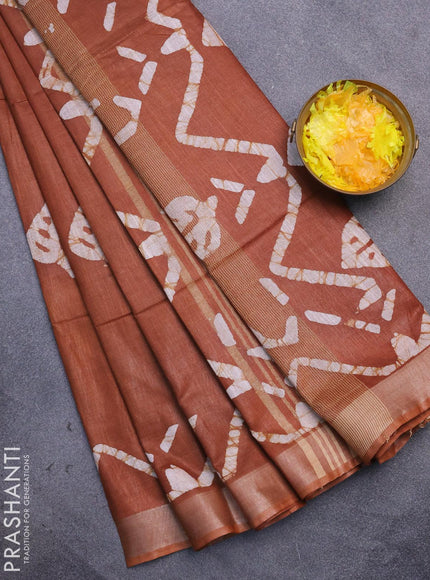 Linen cotton saree brown shade with allover batik butta prints and silver zari woven border