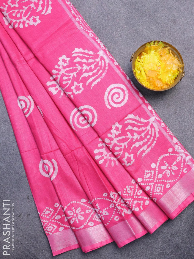 Linen cotton saree pink with allover batik butta prints and silver zari woven border