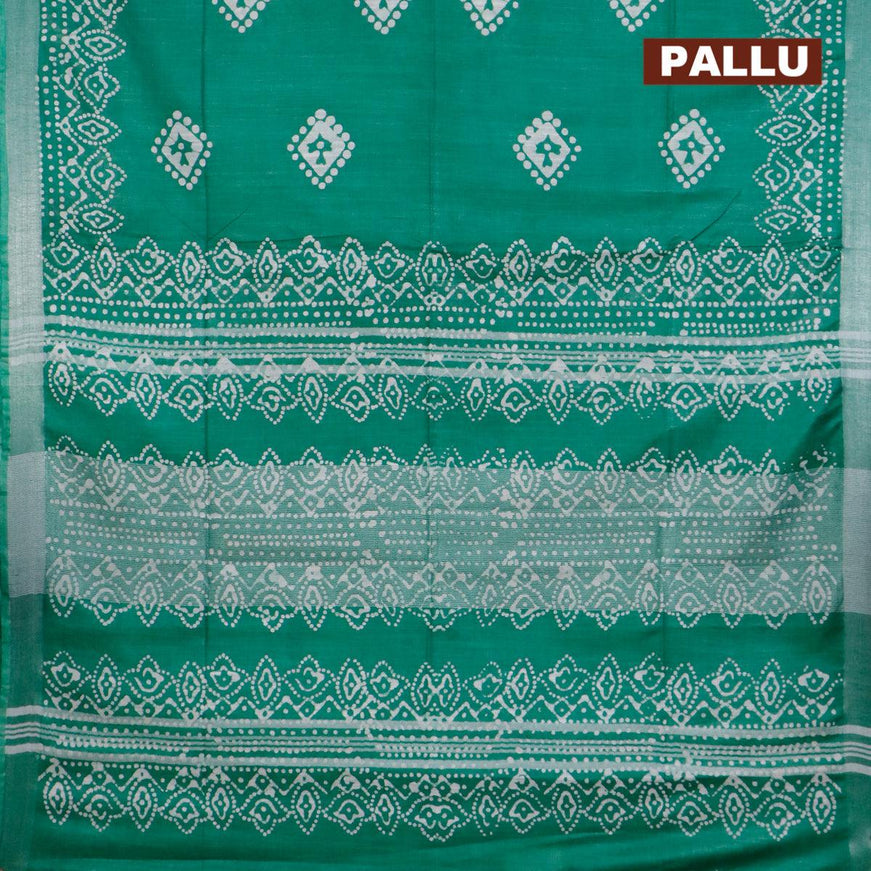 Linen cotton saree green with allover batik butta prints and silver zari woven border