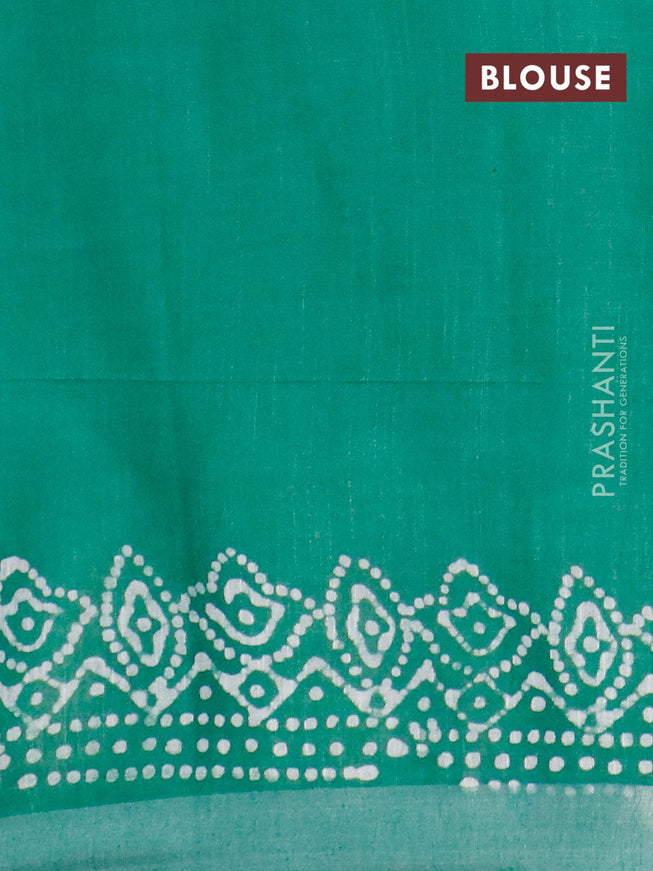 Linen cotton saree green with allover batik butta prints and silver zari woven border