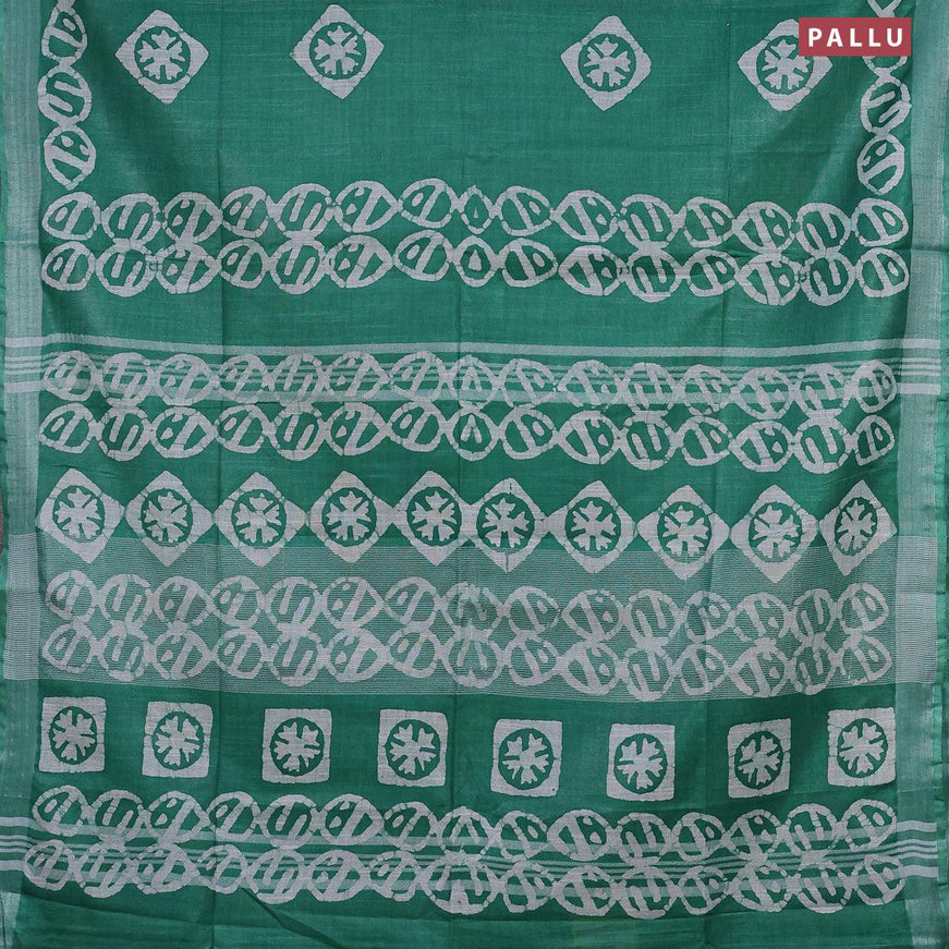 Linen cotton saree green with allover batik butta prints and silver zari woven border