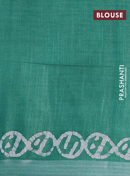 Linen cotton saree green with allover batik butta prints and silver zari woven border