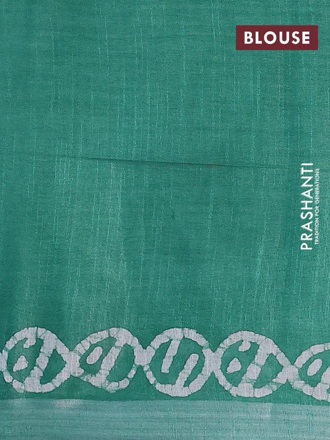 Linen cotton saree green with allover batik butta prints and silver zari woven border