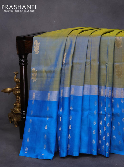 Pure uppada silk saree dual shade of bluish light green and cs blue with silver zari woven buttas and long silver zari woven butta border