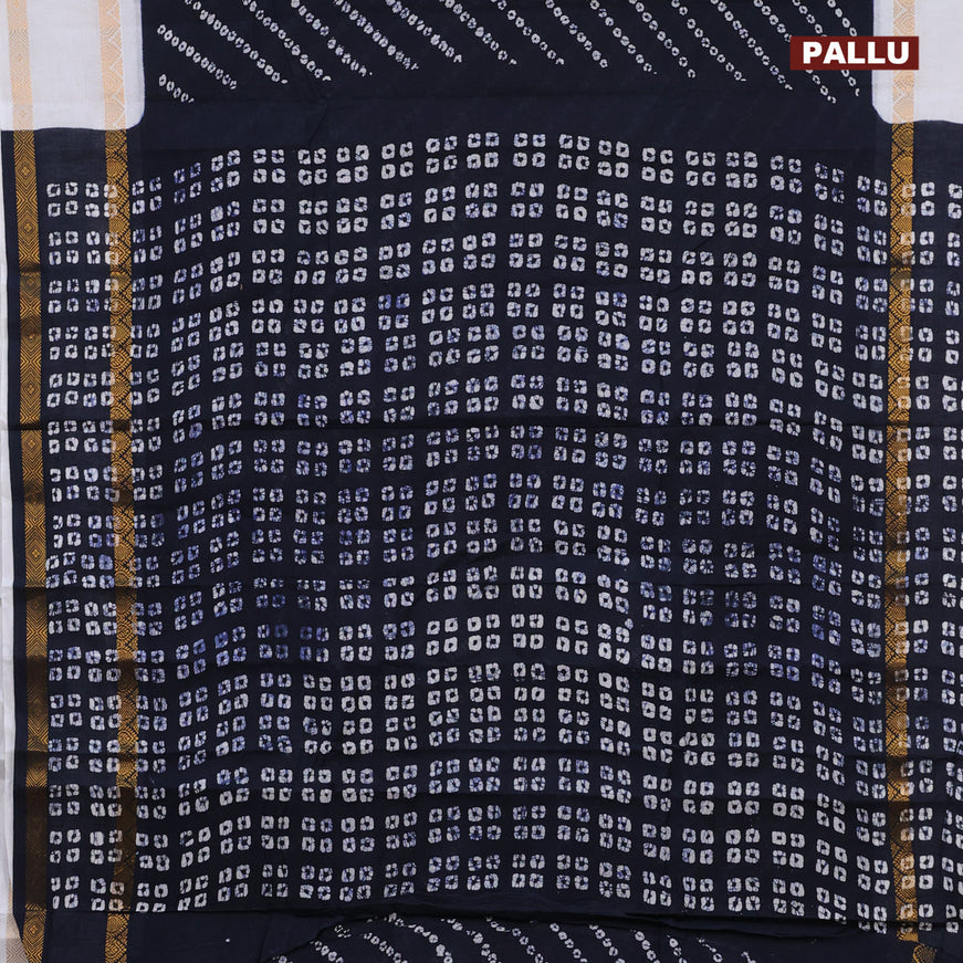 Sungudi cotton saree dark navy blue and off white with allover batik prints and rettapet zari woven border with separate blouse