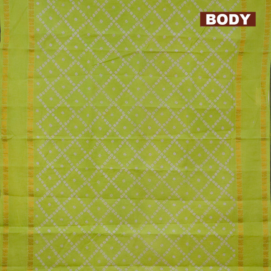 Sungudi cotton saree fluorescent green and purple with allover batik prints and rettapet zari woven border with separate blouse
