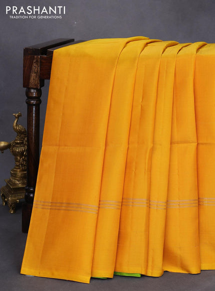 Pure soft silk saree mango yellow and light green with plain body and zari woven simple border