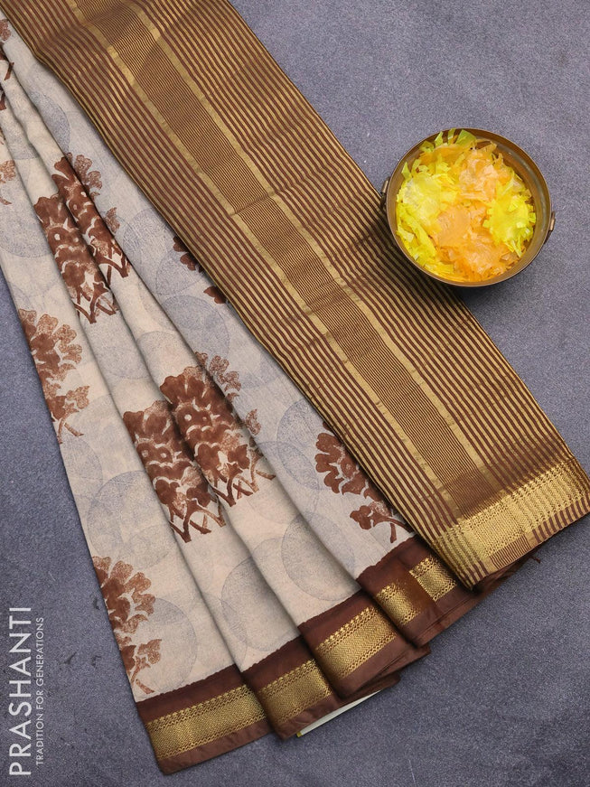 Malai silk saree beige and brown with allover prints and zari woven border