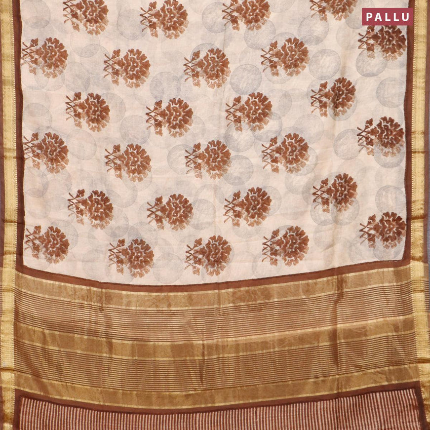 Malai silk saree beige and brown with allover prints and zari woven border