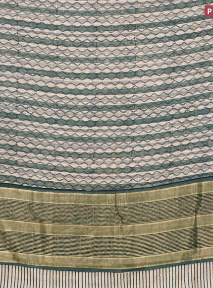 Malai silk saree brige and dark green with allover prints and zari woven border