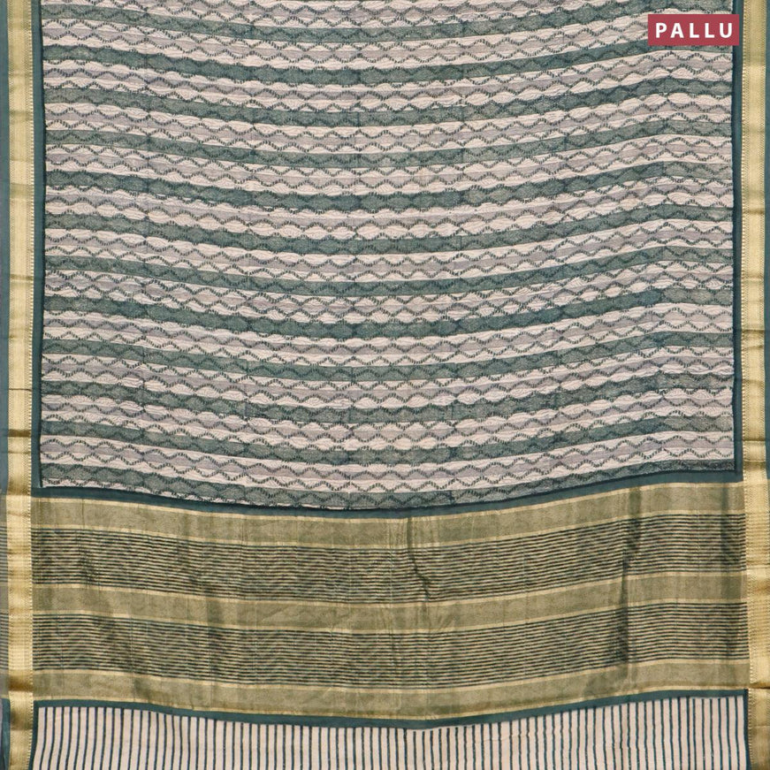 Malai silk saree brige and dark green with allover prints and zari woven border