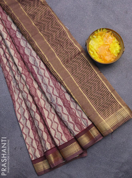 Malai silk saree brige and maroon with allover prints and zari woven border