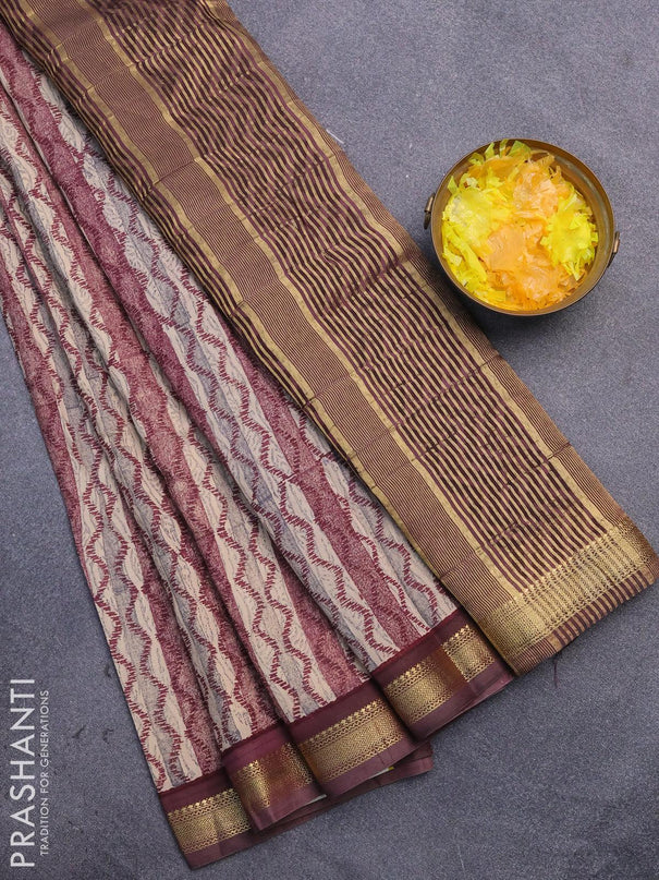 Malai silk saree brige and maroon with allover prints and zari woven border