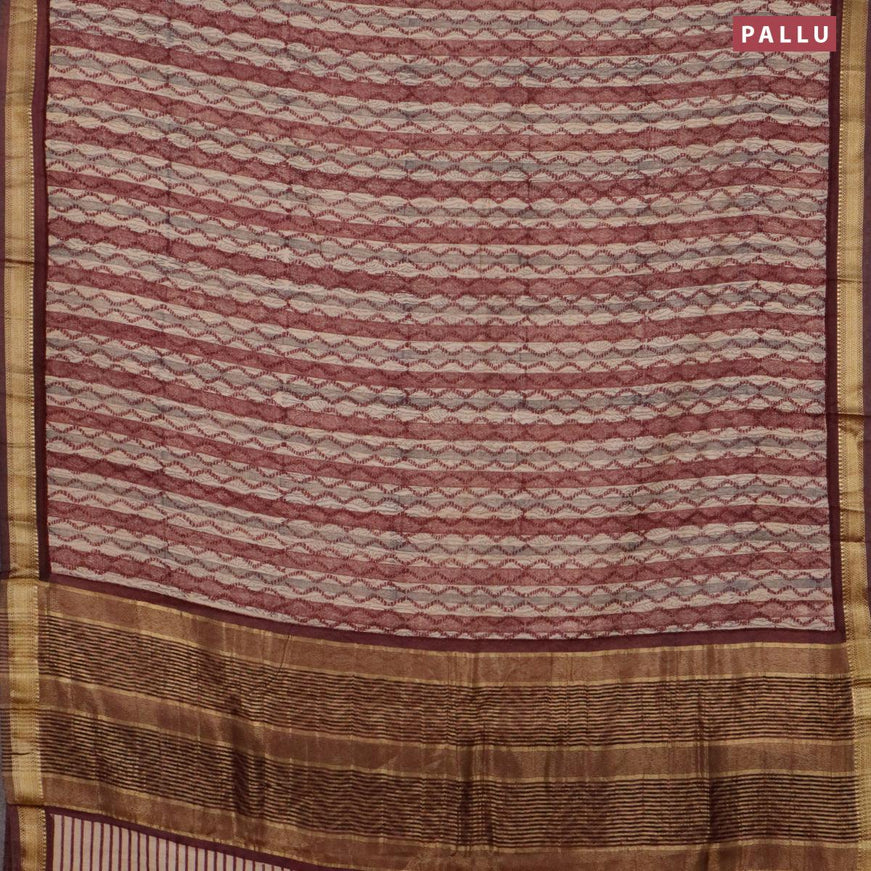 Malai silk saree brige and maroon with allover prints and zari woven border