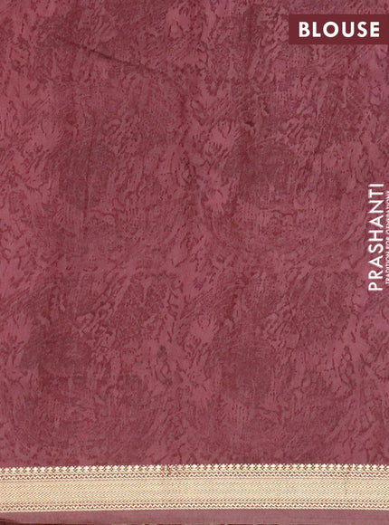 Malai silk saree brige and maroon with allover prints and zari woven border