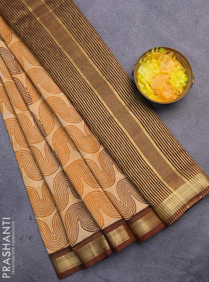 Malai silk saree mustard shade and brown with allover zig zag prints and zari woven border