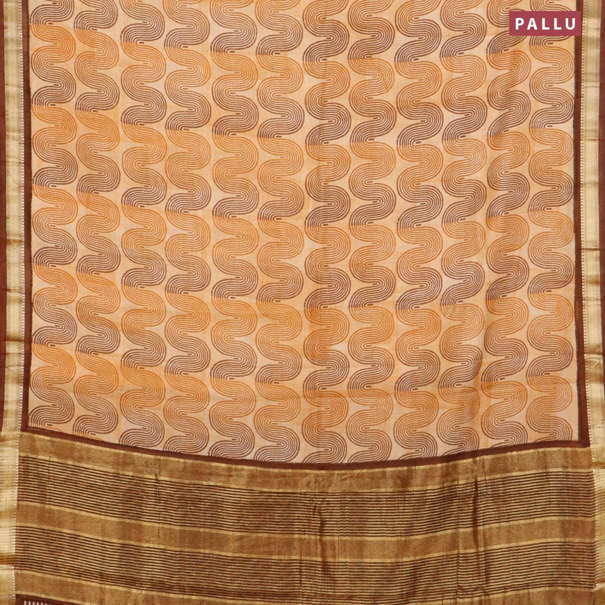 Malai silk saree mustard shade and brown with allover zig zag prints and zari woven border