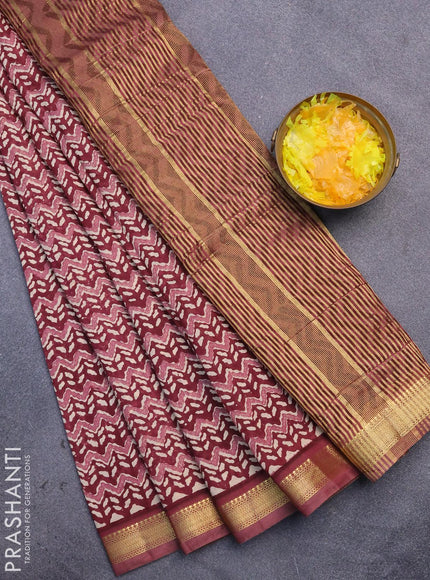 Malai silk saree maroon with allover prints and zari woven border