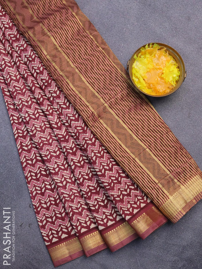 Malai silk saree maroon with allover prints and zari woven border