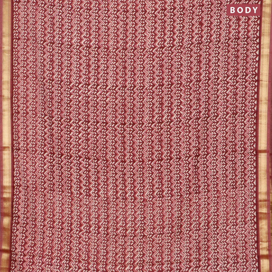 Malai silk saree maroon with allover prints and zari woven border