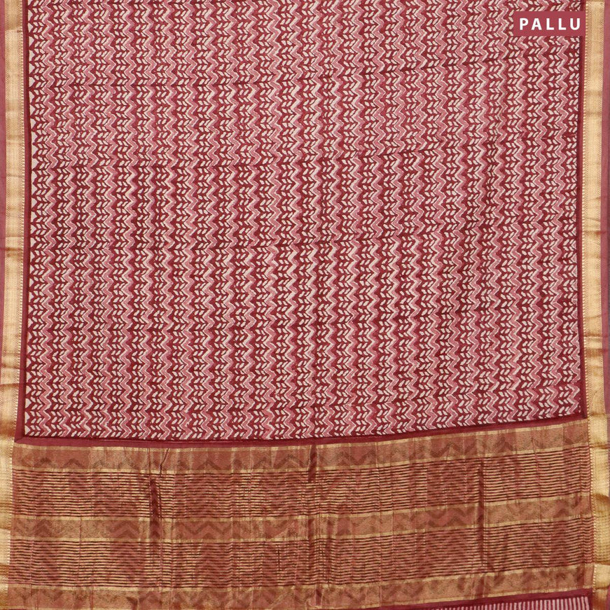 Malai silk saree maroon with allover prints and zari woven border