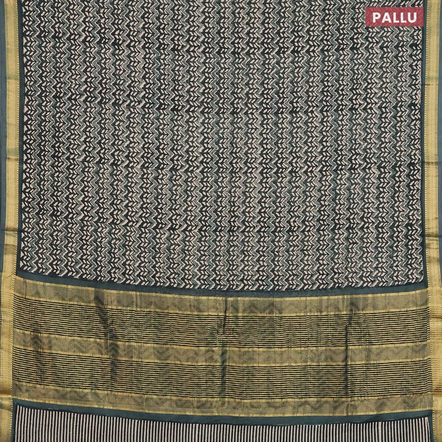 Malai silk saree bottle green with allover prints and zari woven border