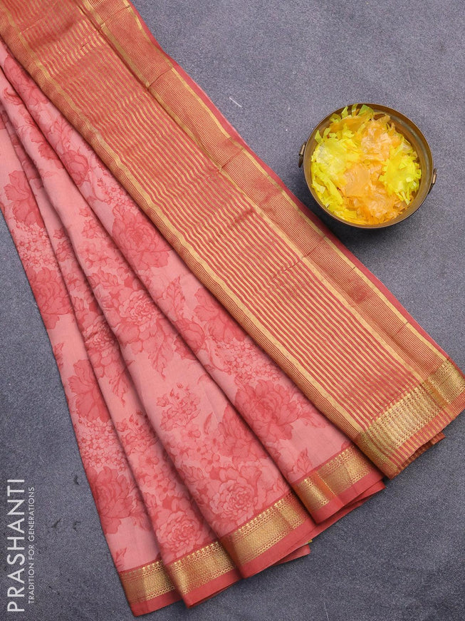 Malai silk saree peach shade with allover floral prints and zari woven border