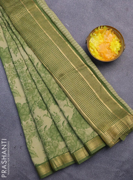 Malai silk saree elaichi green and green with allover floral prints and zari woven border