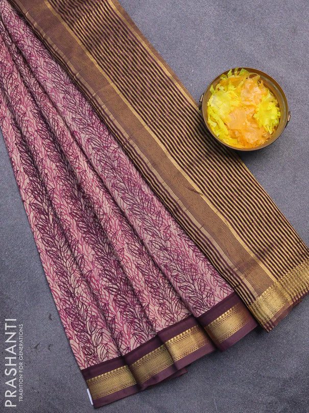 Malai silk saree pink shasde and wine shade with allover prints and zari woven border