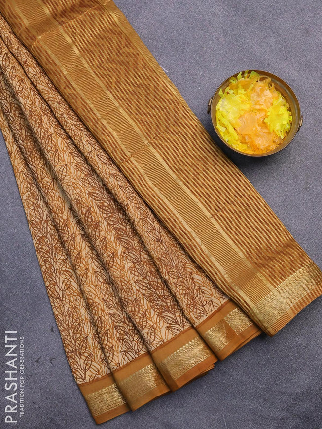 Malai silk saree mustard shade and dark mustard with allover prints and zari woven border