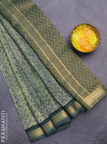 Malai silk saree light green and dark green with allover prints and zari woven border