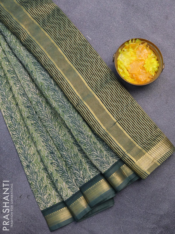 Malai silk saree light green and dark green with allover prints and zari woven border