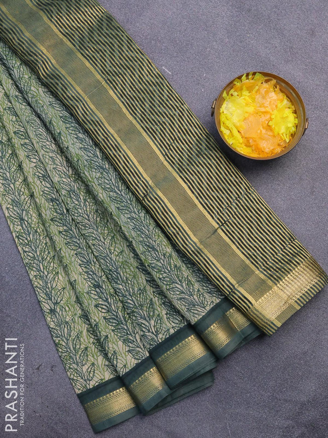 Malai silk saree light green and dark green with allover prints and zari woven border