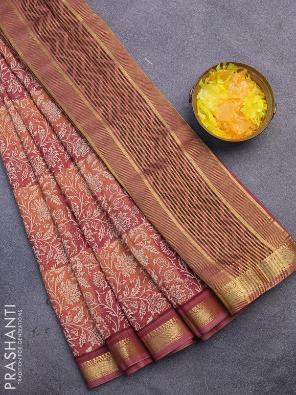 Malai silk saree rust shade and pastel maroon with allover floral prints and zari woven border