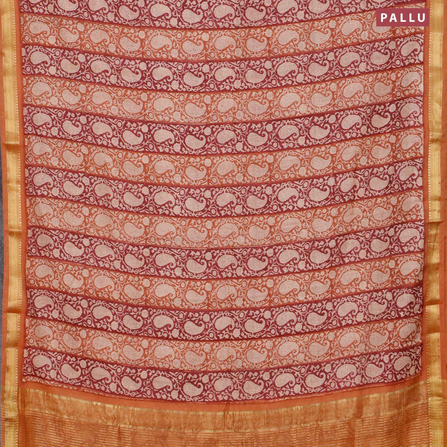 Malai silk saree dark pink and rust shade with allover paisley prints and zari woven border