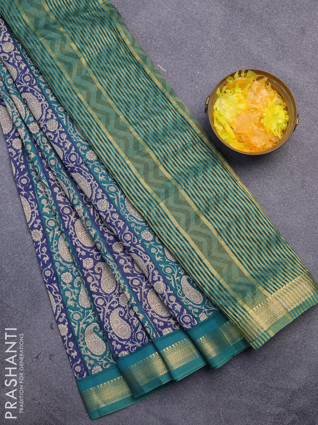 Malai silk saree blue and teal green with allover paisley prints and zari woven border