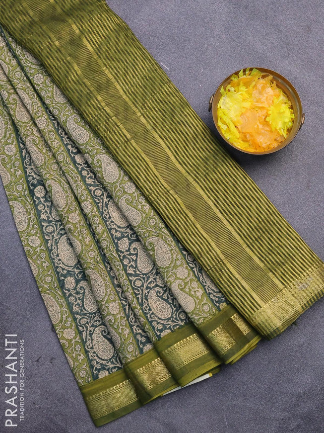 Malai silk saree dark green and mehendi green with allover paisley prints and zari woven border