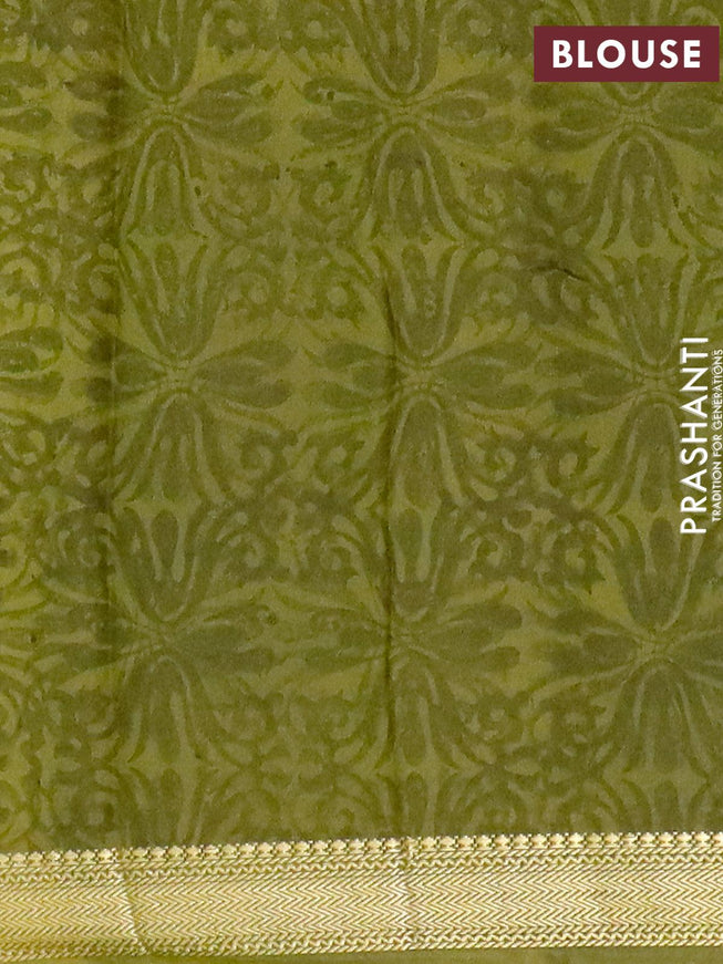 Malai silk saree dark green and mehendi green with allover paisley prints and zari woven border