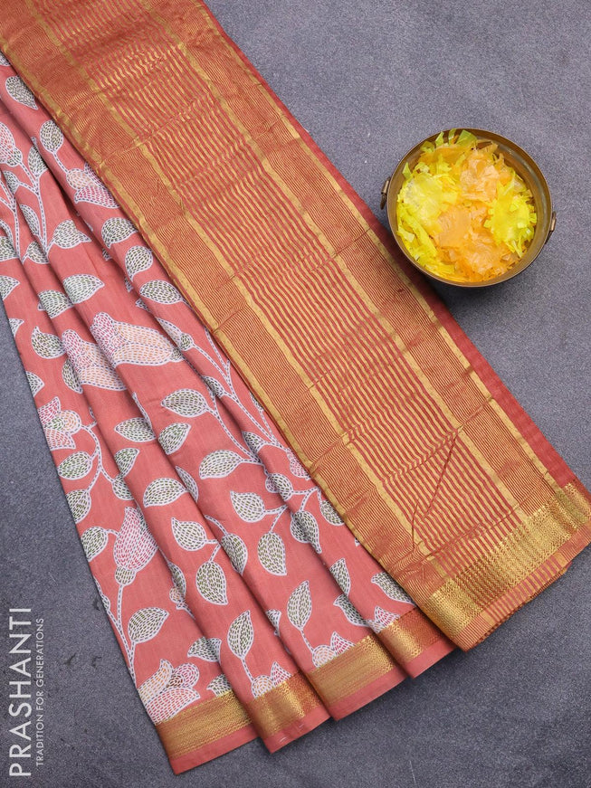 Malai silk saree peach shade with allover prints and zari woven border