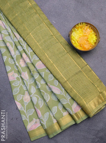 Malai silk saree pastel green with allover prints and zari woven border