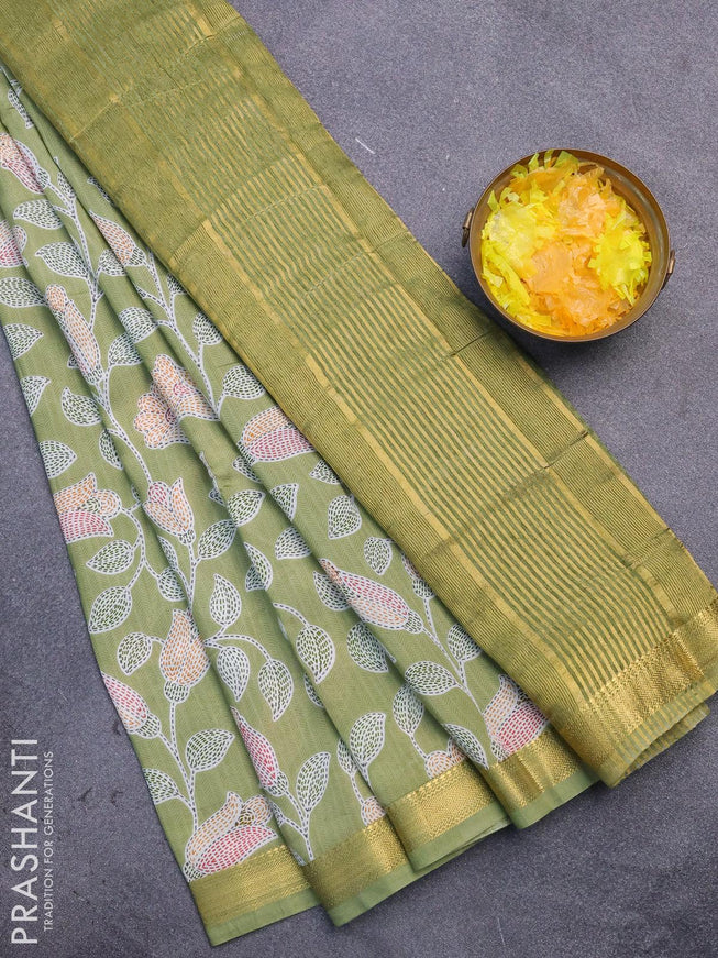 Malai silk saree pastel green with allover prints and zari woven border