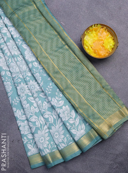 Malai silk saree teal green and off white with allover floral prints and zari woven border