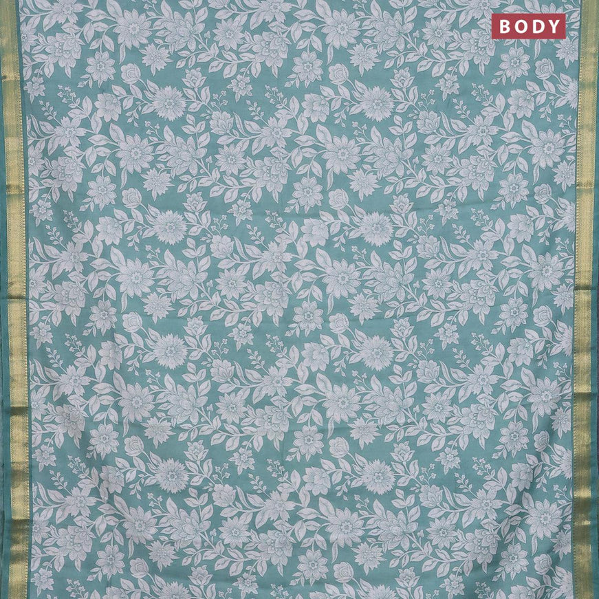 Malai silk saree teal green and off white with allover floral prints and zari woven border