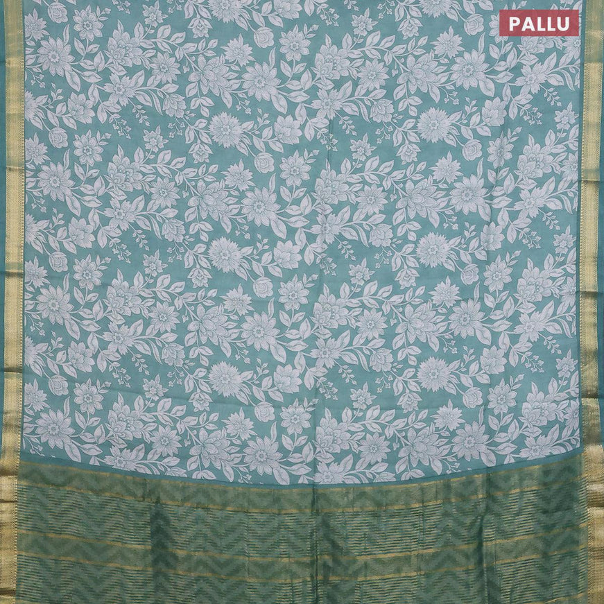 Malai silk saree teal green and off white with allover floral prints and zari woven border