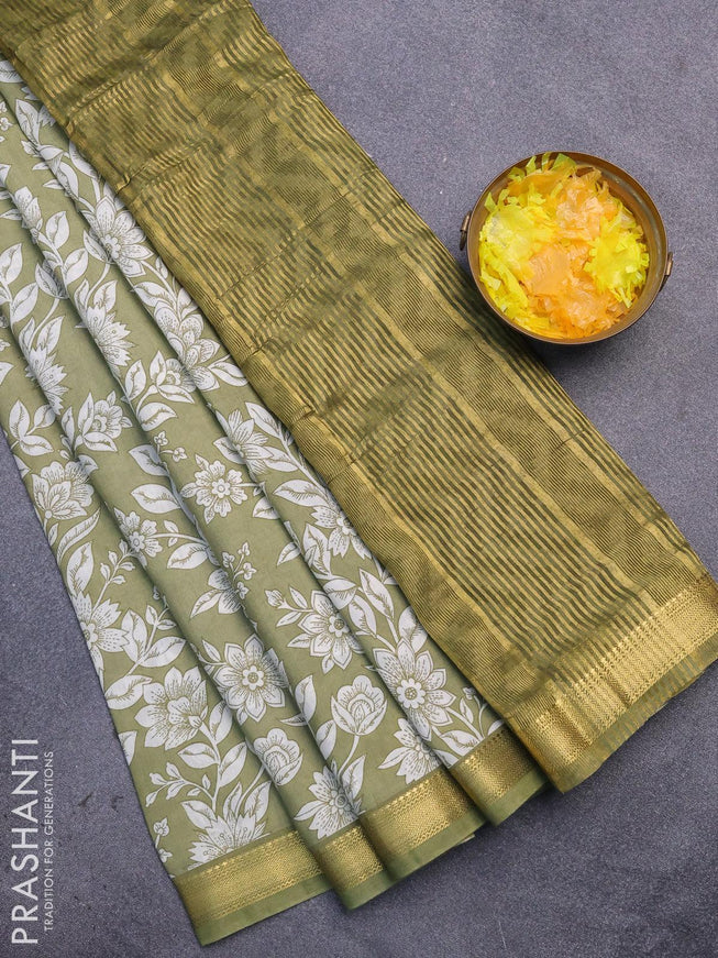 Malai silk saree elaichi green and off white with allover floral prints and zari woven border