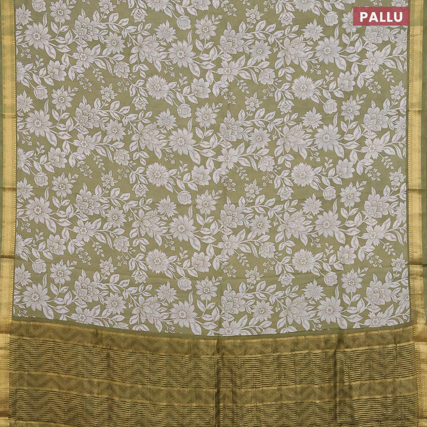 Malai silk saree elaichi green and off white with allover floral prints and zari woven border