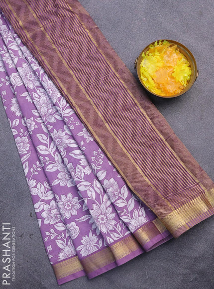 Malai silk saree pastel lavender and off white with allover floral prints and zari woven border